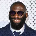 Cédric Doumbé, combattant de MMA signé par le PFL, lors d'un défilé à la Fashion Week. 