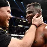 Francis Ngannou et son coach Eric Nicksick à l'UFC 270. 