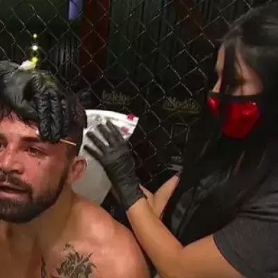 Mike Perry vire ses coachs et se fait assister par sa petite amie en plein combat